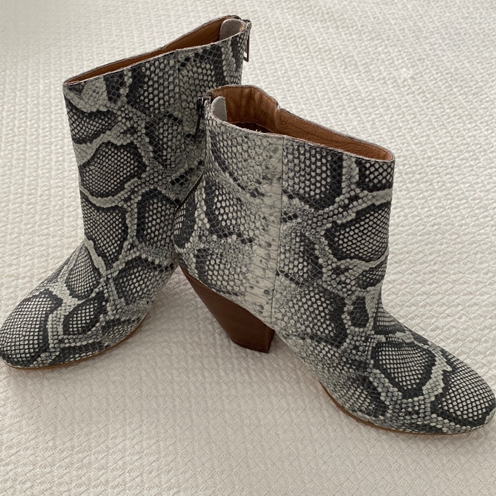 Beautiful grey snakeskin bootie. Back zip. Excellent condition. Barely worn.